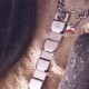 Detalle de eslavones de collar Neck Tech en color metálico Sprenger
