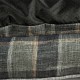 Detalle de base antideslizante sofa grey plaid